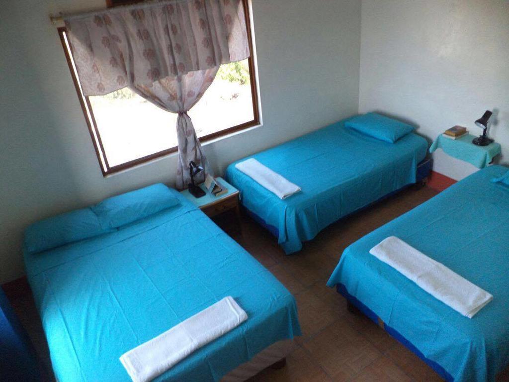 Posada Del Caminante Puerto Villamil Værelse billede